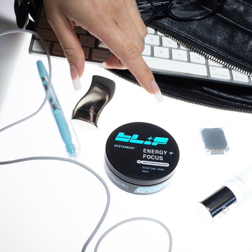 blip nootropic energy pouches, focus pouches with clean ingredients and no jitters or crash. pouches on a messy desk